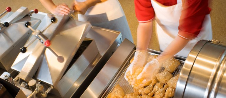cropped-Breading-chicken-with-pressure-fryer-at-side-1.jpg